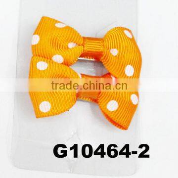 2.5 inch Orange grosgrain ribbon hair bow with white dots