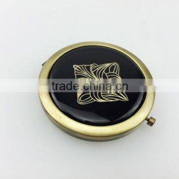 Hot sale metal bronze make up mirror with epoxy sticker