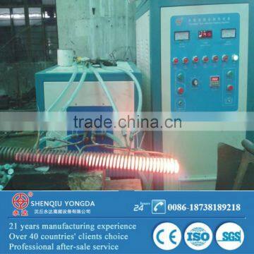 High frequency induction heating machine with forging coils with refractory