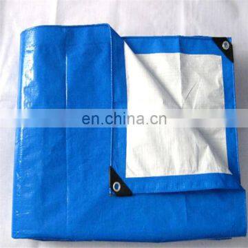 High quality blue white pe tarpaulin with black plastic corner around eyelets