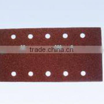 Red abrasive material. cloth piece