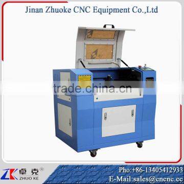 100W 3D Laser Tube ZK-6040 Laser Engraving Cutting Machine With Up And Down Platform With Leetro Control System