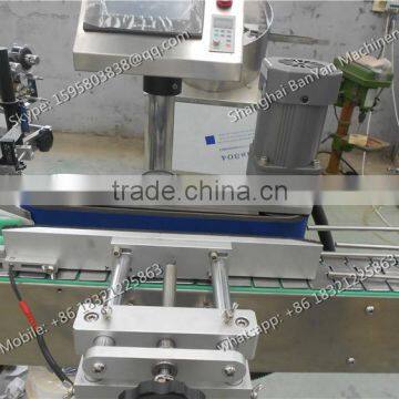 16 Shanghai Manufacturer High Efficiency Glass/ Plastic Round Bottle Labeling Machine photo-5