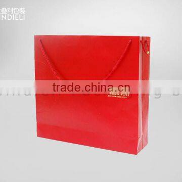 Red string closure paper packaging bag for fashion