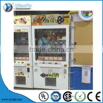 2016 new popular coin operated gift game cheap Factory coin operated claw crane arcade game/toy craw machine/key master