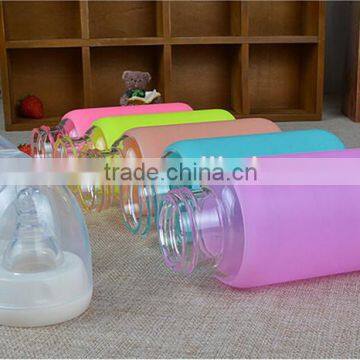 China factory wholesale wide mouth feeding bottle for kids,silicone sleeve glass feeding nipple bottle with lid