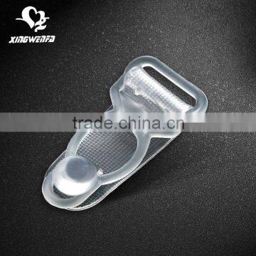 Transparent plastic garter clip