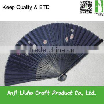 Japanese style bamboo folding fan with black ribs