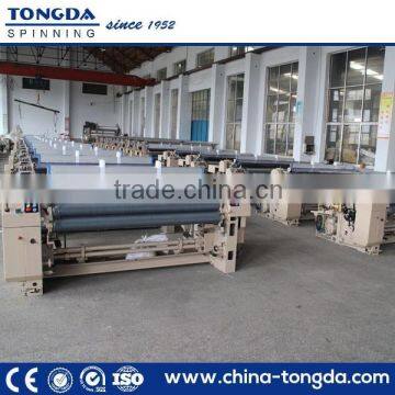 High speed textile weaving water jet loom