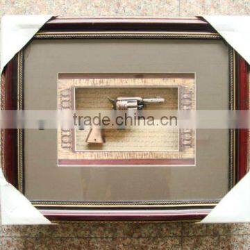 wooden frame with gun