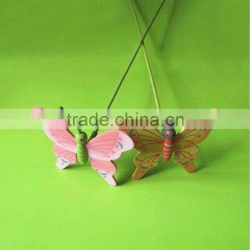 wooden butterfly on stick