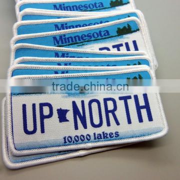 Chinese factory bulk produced woven badges