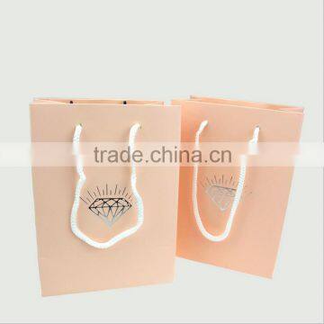 Alibaba wholesale shopping bags of various sizes, pink coated paper bag