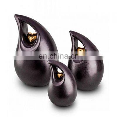 heart shaped metal urns