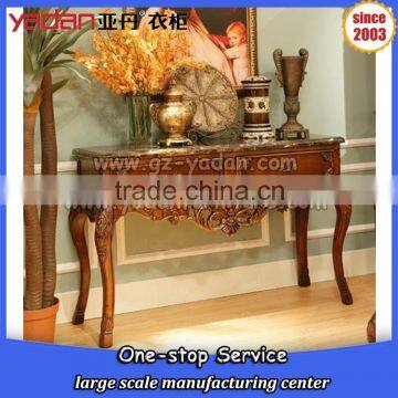 Americal style wood carved console table with marble against wall lobby furniture