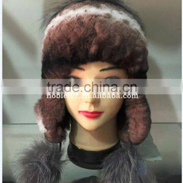 real rabbit with silver fox fur ear flap headwear with flower ball on top