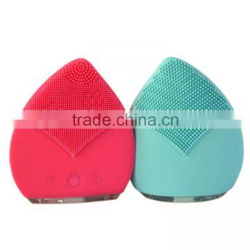 Red color exfoliating face brush skin cleaning device