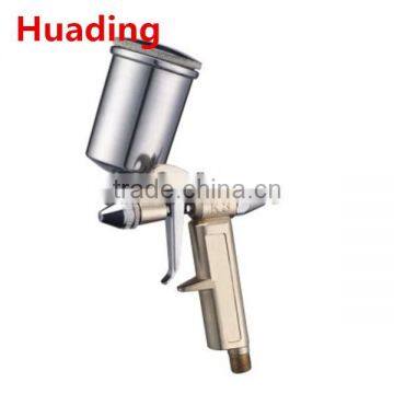 MINI SPRAY GUN This beautiful little spray gun is perfect for small projects. The gun body ,nicked-plated aluminum.