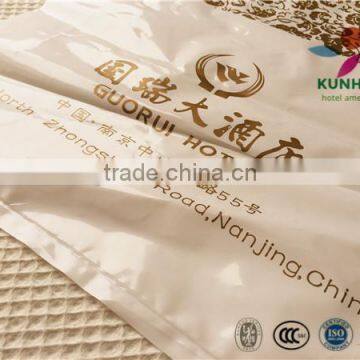 WHOLESALE hotel plastic laundry bag with handle and customized logo