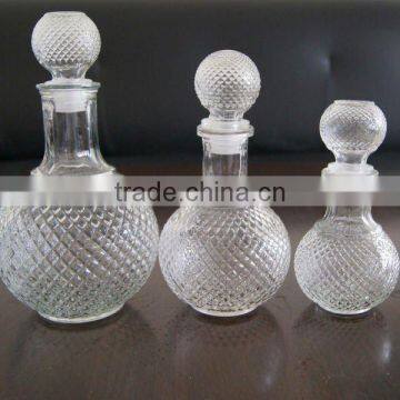 round clear glass wine bottles