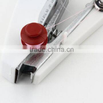 1pcs Brand New Useful Portable Needlework Cordless Mini Hand-Held Clothes Fabrics Sewing Machine photo-4