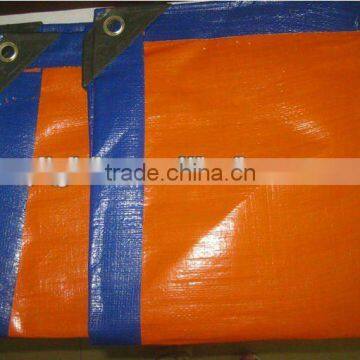 orange pe fabric with plastic corner ad eyelet