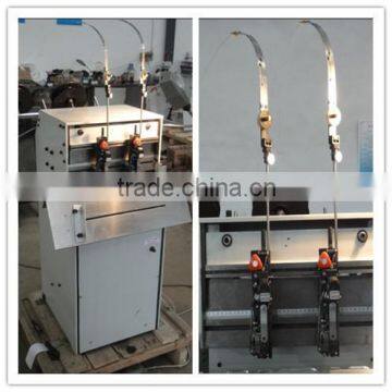 Semi-automatic double stitcher binding machine