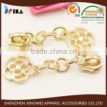 gold metal zipper slider with decorating flower puller for clothes