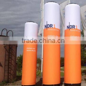 Orange and white inflatable lamp post