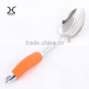 slotted spoon with 0range handle