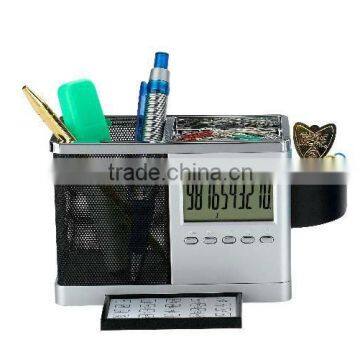 Pen holder with calculator, calendar and clock display