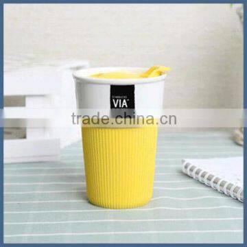 Modern Simple Ceramic Travel Coffee Mug With Silicone Sleeve and Lid photo-6