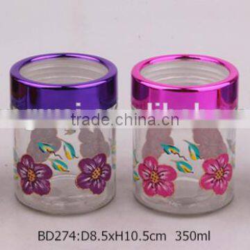 square glass jar with decal and plastic lid