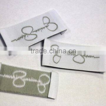 Professional cheap high quality customized logo washable sew on side woven label