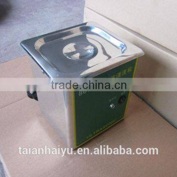 Ultrasonic clean machine for injector