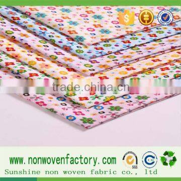 China good quality pp spunbond nonwoven print fabrics,different printed photo fabric