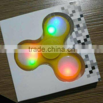 Hot selling desk toy finger fidget spinner with led light