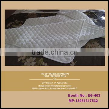 Quilted mattress protector for hotel