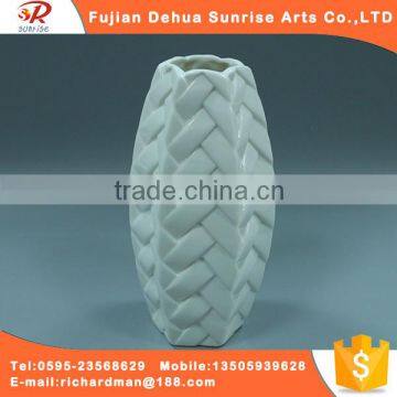 White glazed ceramic shape of bamboo vase