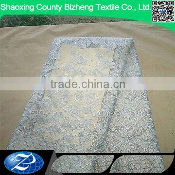 Wholesale white elegant bridal embroidered sequin tulle lace fabric for wedding dress