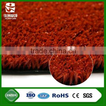 Top quality waterproof sports use red tone artificial grass tiles for golf flooring