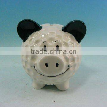 Ceramic money bank in sheep shape