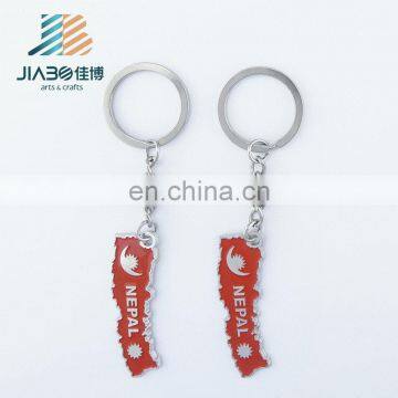 Nepal Soft Enamel Irregular Shaped Souvenir Custom Metal Keychain Supplier photo-3