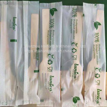 Four in One Cutlery Napkin Spoon Fork Knife Packing Machine photo-2