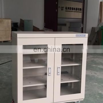 Electric moisture removing automatic humidistat control dry cabinet