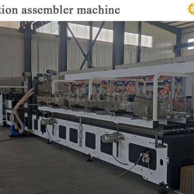 Partition assembler inserting slotting machine