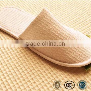 Hotel disposable waffle slipper with EVA purified sole