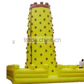 Giant yellow inflatable climbing wall