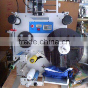 Semi-automatic round bottle labeling machine