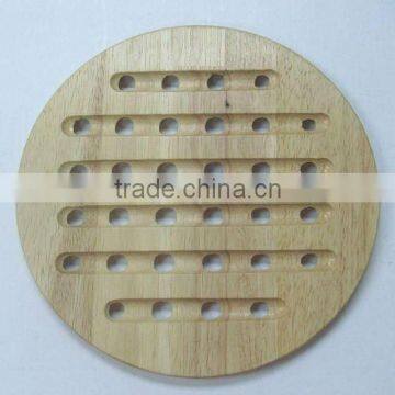 Round wooden trivet